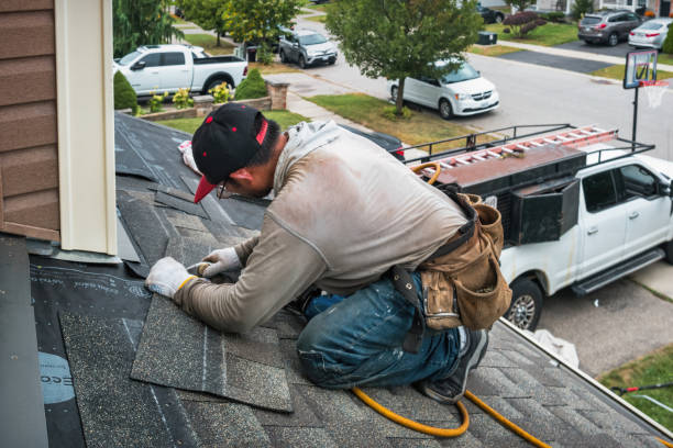Professional Emergency Roof Repair technician working in Lexington, VA